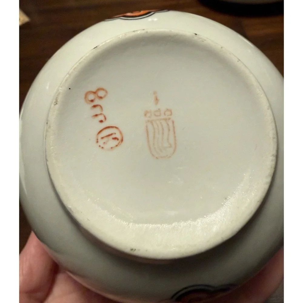 VTG Riga Porcelain Latvia Tea/Dessert Bowl With Orange & Black Ornament gold Rim
